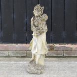 A reconstituted stone garden figure,