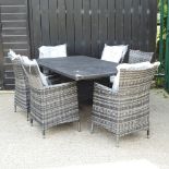 A black rattan garden table, 160 x 100cm,
