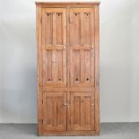 A 19th century pine hall cupboard,