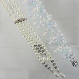 A Guy Laroche four strand simulated pearl necklace,