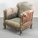 An early 20th century Italian carved and gilt upholstered armchair,