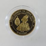 A limited edition Royal Commemorative 14 carat gold $75 coin, from the Pitcairn Islands visit,