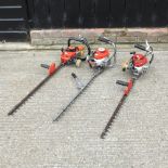 A Kawasaki petrol hedge trimmer,