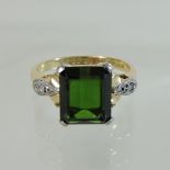 An 18 carat gold diopside and diamond ring,