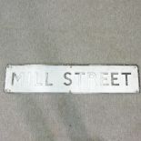 A metal Mill Street road sign, from Nayland, Essex,