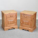 A pair of pine bedside cabinets,