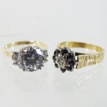 An 18 carat gold sapphire and diamond cluster ring,