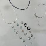 A Pandora bracelet, necklace, another and a collection of Pandora beads,