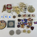 A collection of vintage badges,