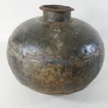 A metal water pot,