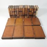 A collection of mainly leather bound books