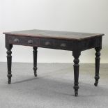 A late Victorian writing desk, with an inset writing surface,