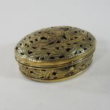 A 19th century pierced brass pot pourri jar and cover,