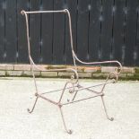 A metal framed garden chair frame