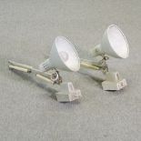 A pair of 1960's cream painted adjustable angle poise wall lights