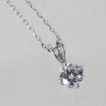 A platinum necklace, with a diamond pendant, approx. 0.