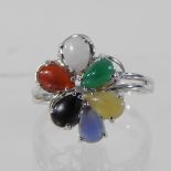 An 18 carat gold and coloured hardstone ring,