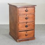 A 19th century pine narrow chest of four drawers,