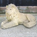 A carved stone model of a lion,