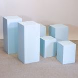 A collection of five various blue painted display plinths,