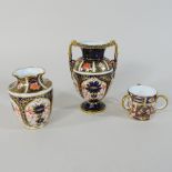 A Royal Crown Derby Imari pattern miniature tyg, together with two various Crown Derby vases,