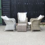 A rattan garden armchair, together with two various other chairs, with cushions, and a coffee table,