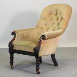 A Victorian carved rosewood and gold upholstered library chair,
