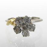 A 14 carat white gold diamond cluster ring, approximately 1.
