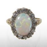 A yellow metal opal and diamond cluster ring, unmarked,