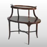 An Edwardian mahogany and inlaid oval etagere, with a glass tray top, on swept legs,