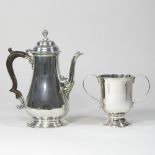 A silver plated coffee pot, of Georgian style, with a pear wood handle, 26cm high,