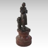 A 19th century bronze figure of Joan of Arc, on a marble base,