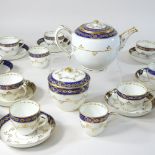 An 18th century Caughley Salopian porcelain part tea service, with blue and gilt decoration,