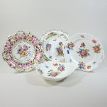 A 19th century Derby style porcelain cabinet plate, painted with a bouquet of flowers,