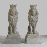 A pair of reconstituted stone garden statues of lions, of large proportions,