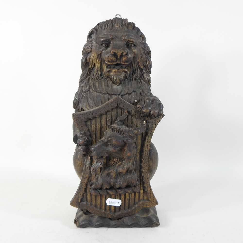 A 17th century style carved oak model of an heraldic lion, shown upright, - Image 2 of 7