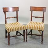 A set of four Regency mahogany dining chairs,