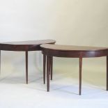 A pair of George III mahogany half round side tables, on square tapered legs,