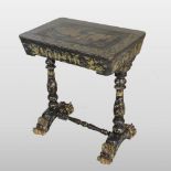 A 19th century Chinese export black lacquered ladies work table, with gilt decoration,