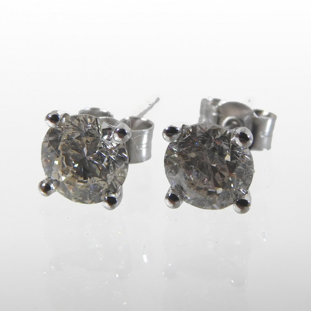 A pair of 18 carat white gold diamond stud earrings, approximately 2.