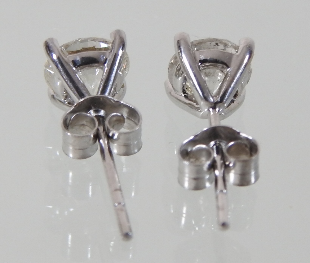 A pair of 18 carat white gold diamond stud earrings, approximately 2. - Image 2 of 3
