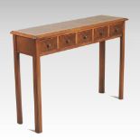A bespoke made walnut hall table, containing five drawers,