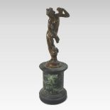 A bronze figure of a partially draped classical lady, shown standing,