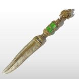 An ornate Faberge style silver gilt and diamond set paper knife,