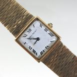 A Jean Renet 9 carat gold cased ladies wristwatch, the square dial with Roman hours,