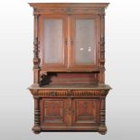 A 19th century continental carved walnut buffet,