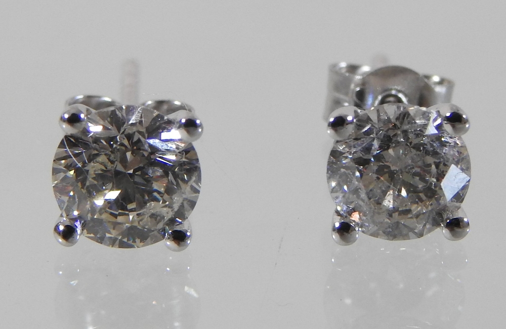 A pair of 18 carat white gold diamond stud earrings, approximately 2. - Image 3 of 3