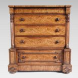 A Victorian flame mahogany Scottish chest, containing five long drawers, between scrolled pilasters,