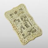 A 19th century Chinese canton carved ivory visiting card case, of waisted rectangular shape,