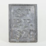 A George IV lead plaque, of rectangular shape, inscribed in relief S.T P.P.